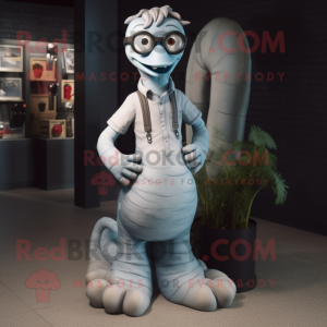 Gray Hydra mascot costume character dressed with a Flare Jeans and Eyeglasses