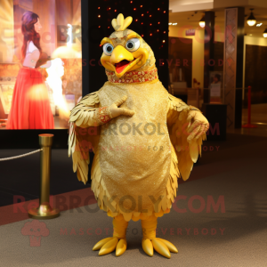 Zlatá postava maskota kuře...