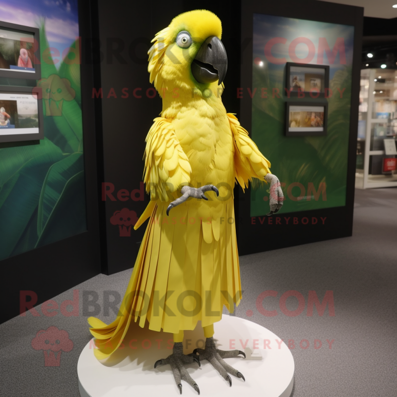 Lemon Yellow Macaw mascot costume character dressed with a Pleated Skirt and Brooches Lemon Yellow Macaw mascot costume character dressed with a Pleated Skirt and Brooches