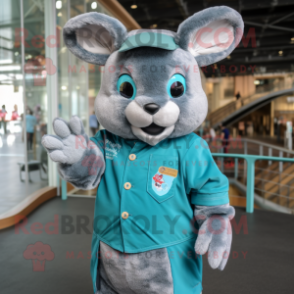 Teal Chinchilla mascot costume character dressed with a Polo Shirt and Gloves