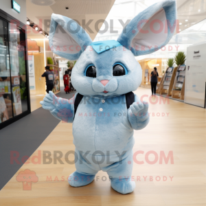 Sky Blue Chinchilla mascot costume character dressed with a Trousers and Caps