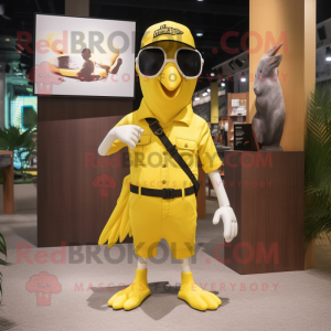 Lemon Yellow Woodpecker mascot costume character dressed with a T-Shirt and Sunglasses