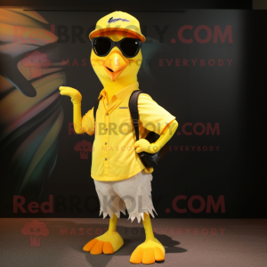 Lemon Yellow Woodpecker mascot costume character dressed with a T-Shirt and Sunglasses