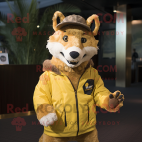 Gold Dingo mascot costume character dressed with a Jacket and Caps