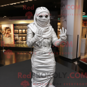 Sølv mamma-maskotdraktfigur...