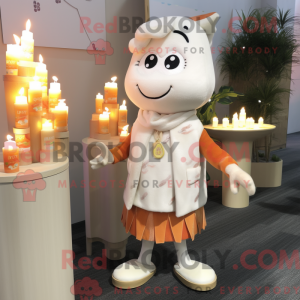 Cremefarbene Duftkerze als...
