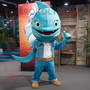 Turquoise Swordfish mascot costume character dressed with a Flare Jeans and Caps