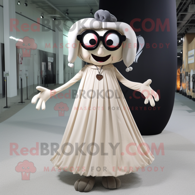 Beige Vampire mascot costume character dressed with a Maxi Skirt and Eyeglasses Beige Vampire mascot costume character dressed with a Maxi Skirt and Eyeglasses