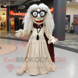 Beige Vampire mascot costume character dressed with a Maxi Skirt and Eyeglasses
