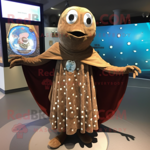 Brown Ray mascot costume character dressed with a Empire Waist Dress and Shawl pins