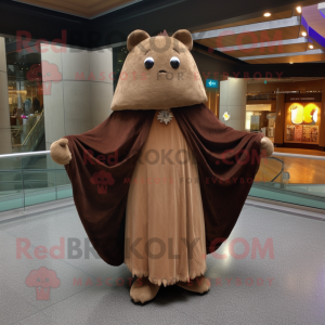 Brown Ray mascot costume character dressed with a Empire Waist Dress and Shawl pins