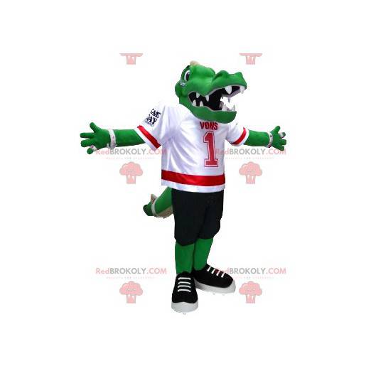 Mascote crocodilo verde com equipamento de futebol americano -