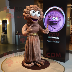 Brown Medusa mascot costume character dressed with a Evening Gown and Digital watches