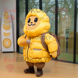 Yellow Croissant mascot costume character dressed with a Parka and Messenger bags