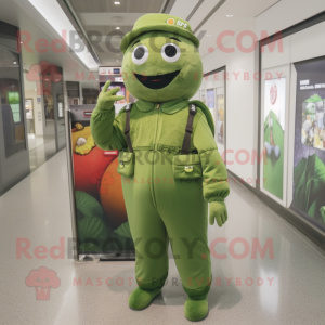 Olive Melon mascot costume character dressed with a Jumpsuit and Brooches