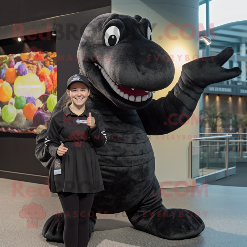 Black Diplodocus mascot costume character dressed with a A-Line Skirt and Beanies