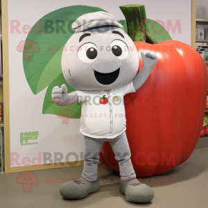 Gray Tomato mascot costume character dressed with a Chinos and Shoe laces