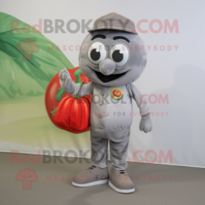 Gray Tomato mascot costume character dressed with a Chinos and Shoe laces