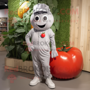 Gray Tomato mascot costume character dressed with a Chinos and Shoe laces