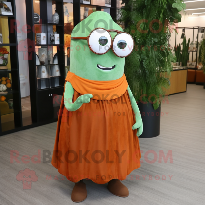 Rust Cucumber mascot costume character dressed with a Circle Skirt and Reading glasses Rust Cucumber mascot costume character dressed with a Circle Skirt and Reading glasses