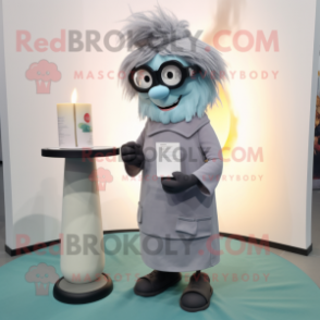 Gray Scented Candle mascot costume character dressed with a Culottes and Reading glasses