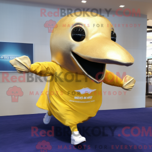 Guld pukkelhval maskot...