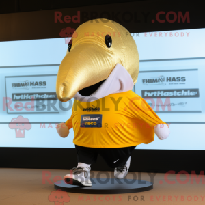 Guld pukkelhval maskot...