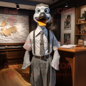 Gray Goose mascot costume character dressed with a Dress Shirt and Suspenders