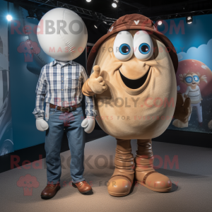 Tan Rugby Ball mascot costume character dressed with a Boyfriend Jeans and Tie pins