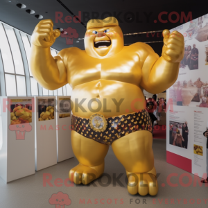 Gold Strongman maskot...