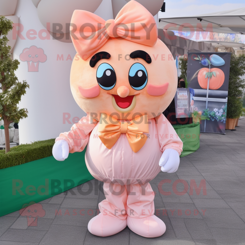 Peach Candy mascot costume character dressed with a Cargo Pants and Bow ties Peach Candy mascot costume character dressed with a Cargo Pants and Bow ties
