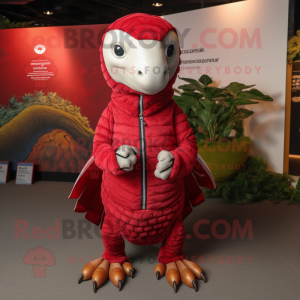 Red Pangolin mascot costume character dressed with a Polo Shirt and Shawls