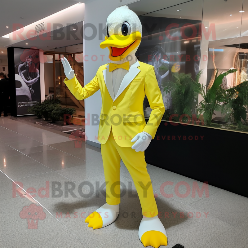 Lemon Yellow Swan mascot costume character dressed with a Suit Pants and Gloves