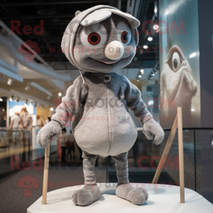 Gray Tightrope Walker mascot costume character dressed with a Cover-up and Beanies