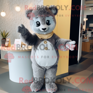 Grå champagne maskot...