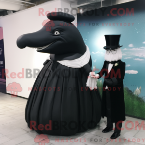 Sort pukkelhval maskot...