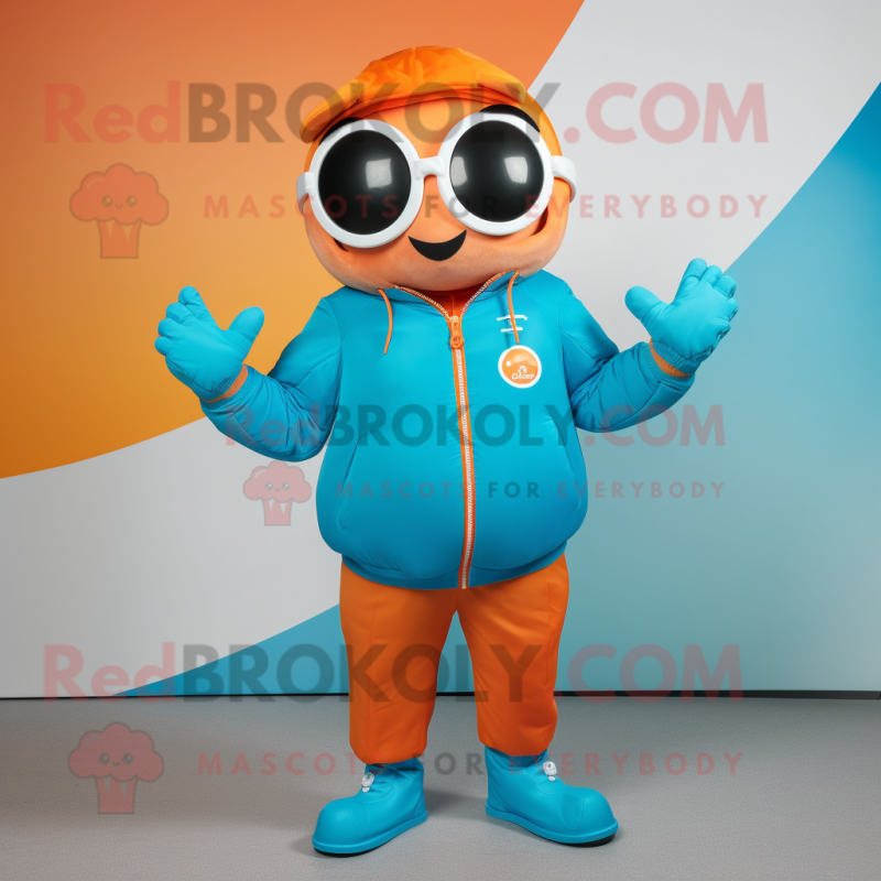 Cyan Orange mascot costume character dressed with a Windbreaker and Suspenders