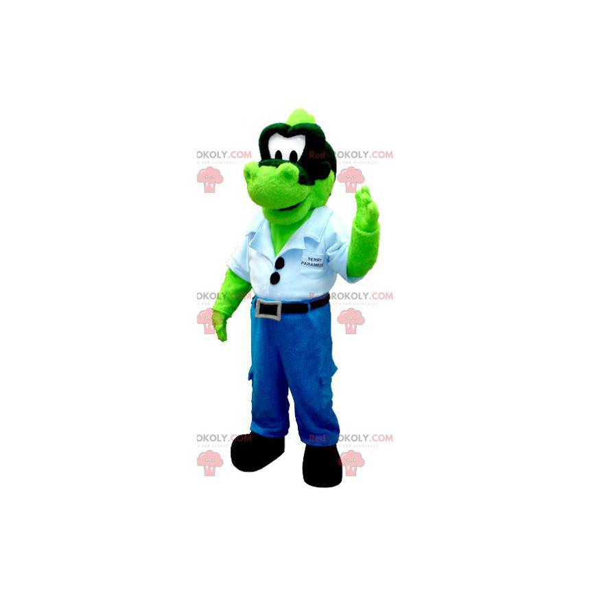 Green dinosaur mascot in jeans with a blue shirt -