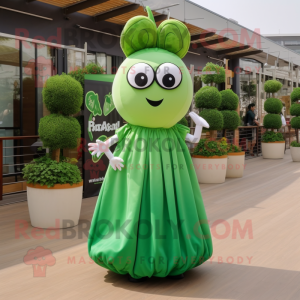 Green Radish mascot costume character dressed with a Maxi Dress and Shoe clips