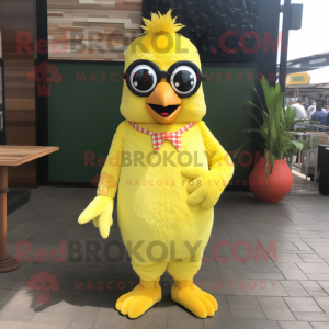 Lemon Yellow Tandoori Chicken mascot costume character dressed with a Romper and Eyeglasses