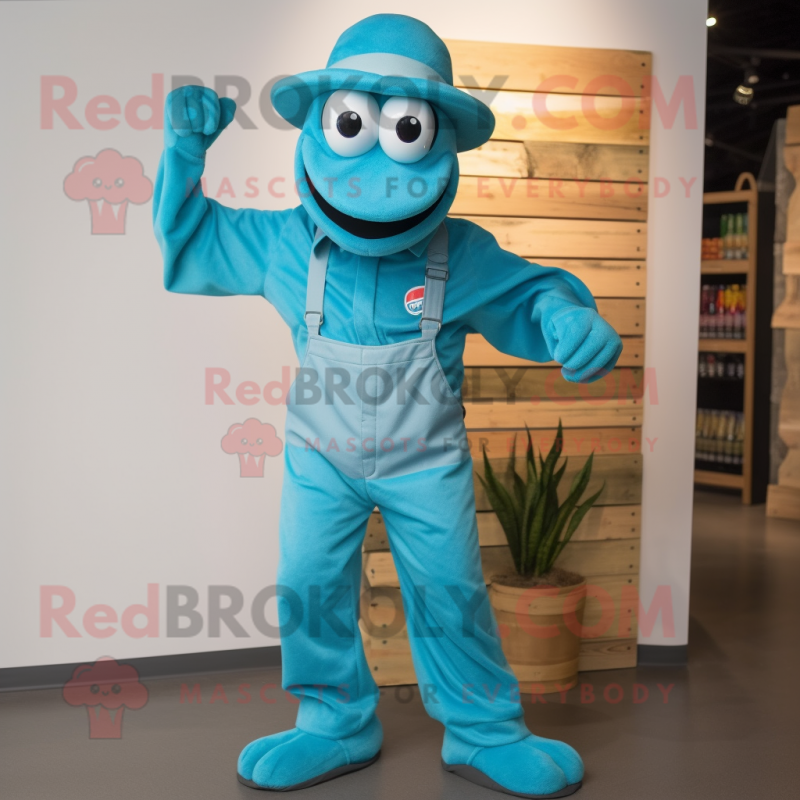 Cyan Python mascot costume character dressed with a Dungarees and Hat pins Cyan Python mascot costume character dressed with a Dungarees and Hat pins