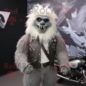 Gray Yeti mascot costume character dressed with a Biker Jacket and Tie pins