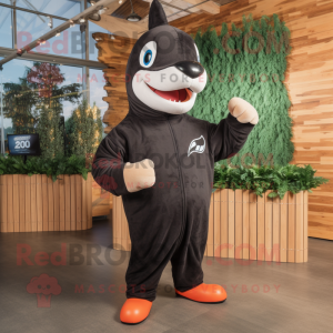 Rust Killer Whale mascot costume character dressed with a Sweatshirt and Headbands