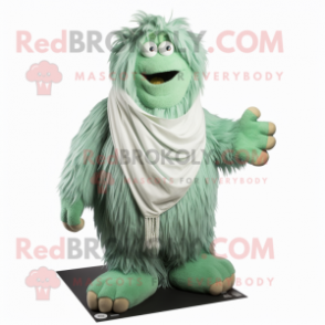 Green Yeti mascot costume character dressed with a Shorts and Scarves