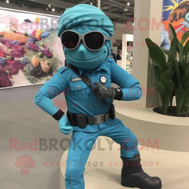 Turquoise Para Commando mascot costume character dressed with a Skinny Jeans and Bracelet watches Turquoise Para Commando mascot costume character dressed with a Skinny Jeans and Bracelet watches