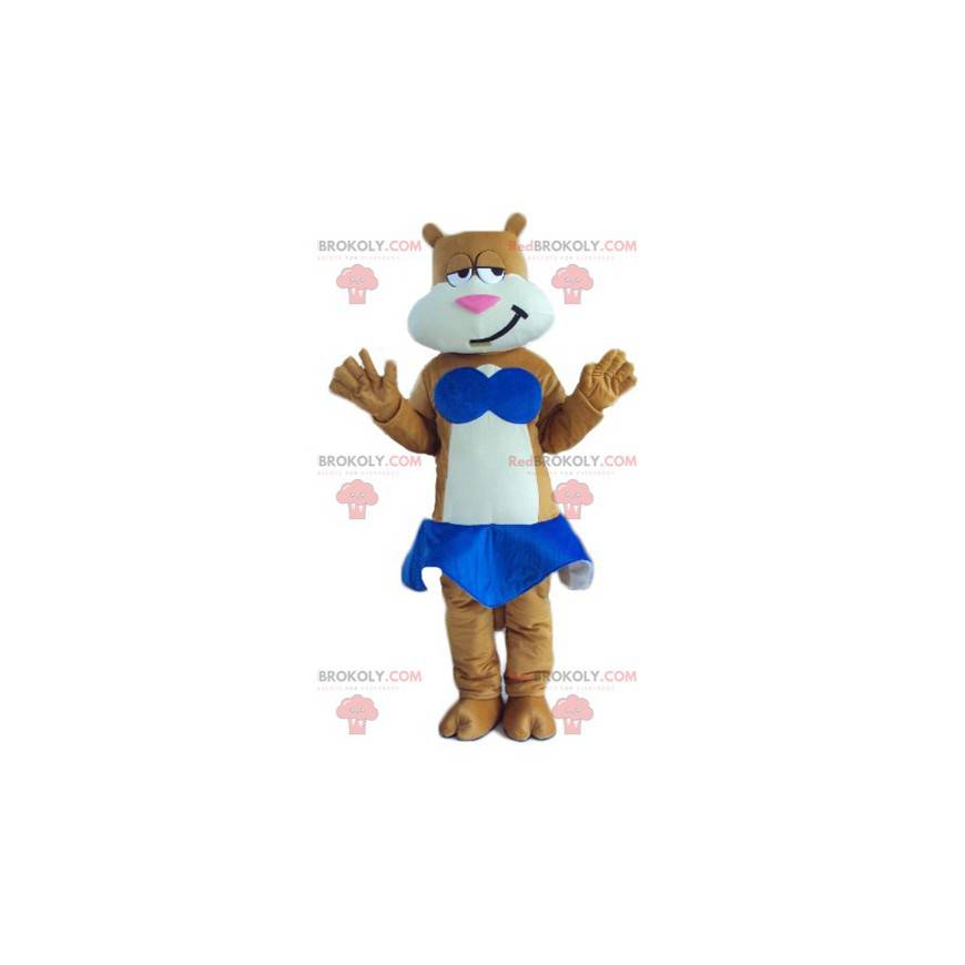 Mascote gato marrom e branco com saia azul - Redbrokoly.com