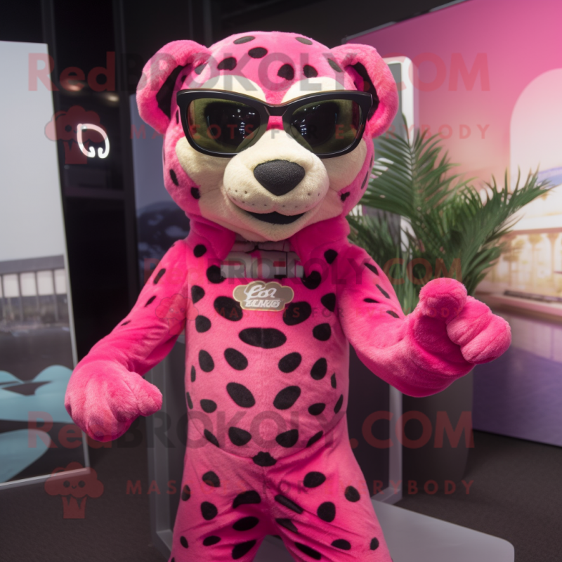 Pink Cheetah mascot costume character dressed with a Tank Top and Sunglasses Pink Cheetah mascot costume character dressed with a Tank Top and Sunglasses