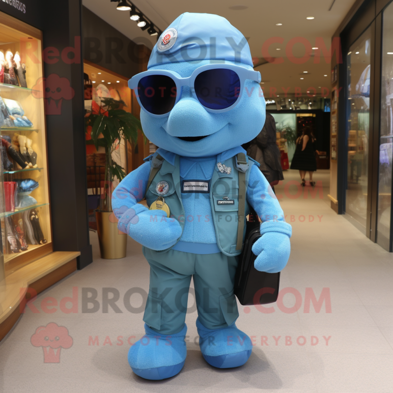 Blue Special Air Service mascot costume character dressed with a Vest and Tote bags