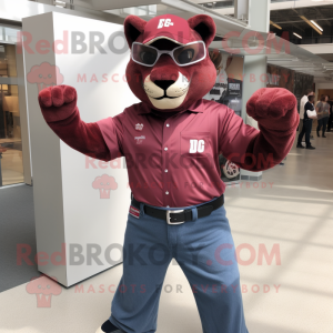 Maroon Puma mascot costume character dressed with a Denim Shirt and Belts