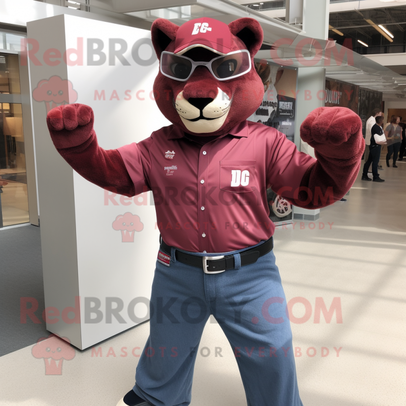 Maroon Puma mascot costume character dressed with a Denim Shirt and Belts Maroon Puma mascot costume character dressed with a Denim Shirt and Belts